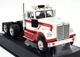 Diecast model truck with white cab, red stripe, chrome grille and front bumper, black tires