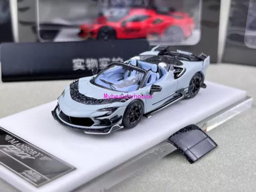 Gray convertible sports diecast model car with black wheels and open top