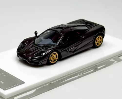 1:64 diecast racing sports car model, black with gold wheels