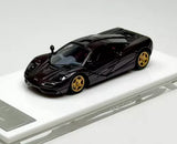 1:64 diecast racing sports car model, black with gold wheels