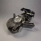 1/24 diecast car model, dark metallic black, open doors