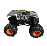 Silver and black monster truck toy with oversized tires and orange wheel hubs