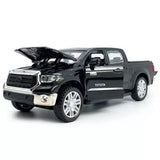 Black Toyota Tundra diecast pickup model car with pull-back action, open hood
