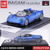 Blue Pagani Huayra 1:43 diecast roadster model on display base