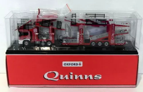 Diecast car transporter in clear case, red and black truck model