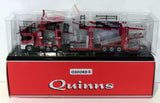 Diecast car transporter in clear case, red and black truck model