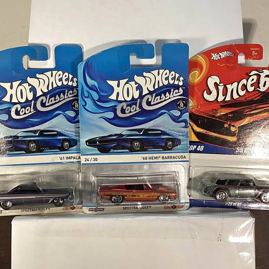Hot Wheels diecast car blister packs with assorted models in blue and red packaging