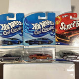 Hot Wheels diecast car blister packs with assorted models in blue and red packaging