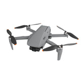Gray mini quadcopter drone with four propellers and front camera module