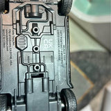 Firebird diecast toy vehicle underside detail with wheels and molded mechanical parts
