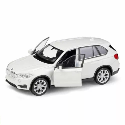 White diecast SUV model car with open driver door and detailed wheels