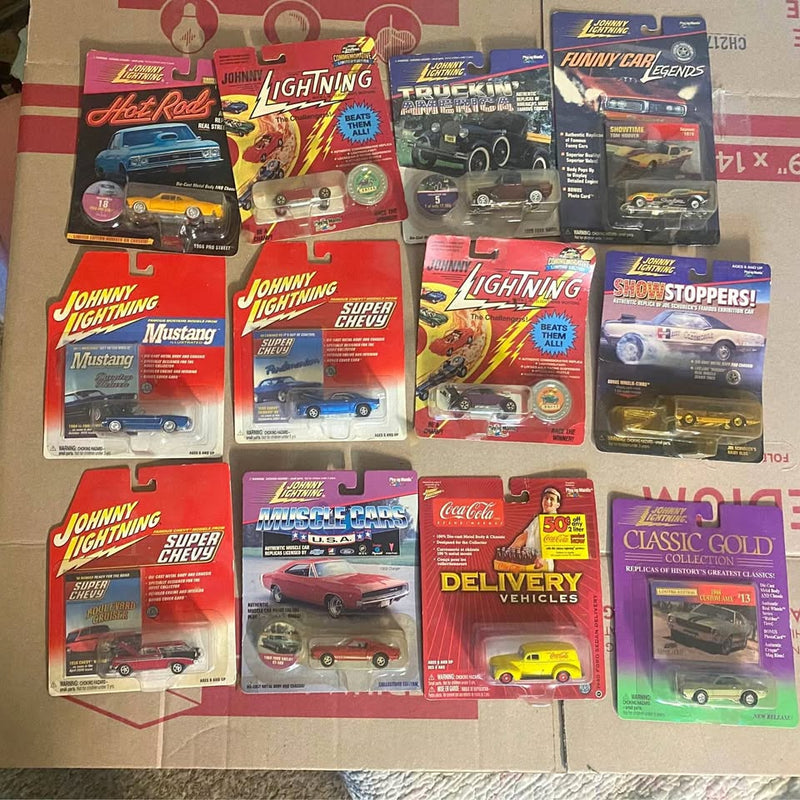 Boxed diecast collector cars set, featuring multiple Mustang, Chevy, and delivery vehicles