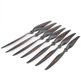 Fixed-wing drone propeller set, dark gray with red X markings and mounting hubs