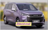 Purple diecast MPV model car with detailed grille and headlights