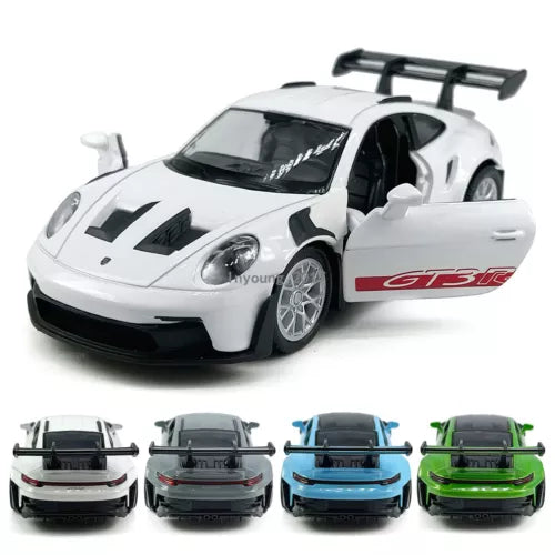 White diecast racing car model with black stripes and rear spoiler; multiple rear views shown