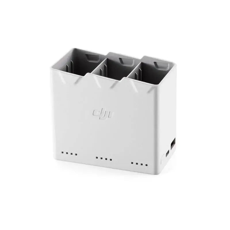 White multi-bay battery charging dock with vented slots and charging ports