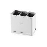 White multi-bay battery charging dock with vented slots and charging ports