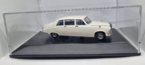 White 1/43 scale Daimler DS240 limousine diecast model car in clear display case