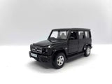 Black Mercedes-Benz G63 AMG diecast SUV model car, front three-quarter view.
