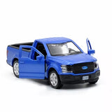 Blue 1/36 diecast pickup truck model with open driver-side door and chrome wheels