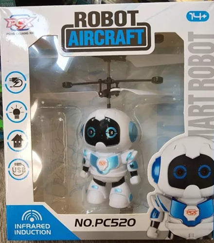 White and blue robot aircraft helicopter toy with rotating propeller, in retail box