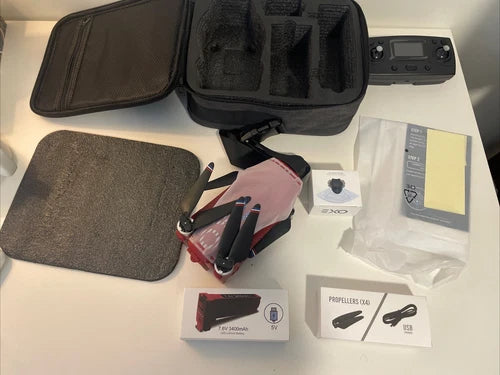 Ranger drone kit with carry case, remote controller, batteries, and propellers