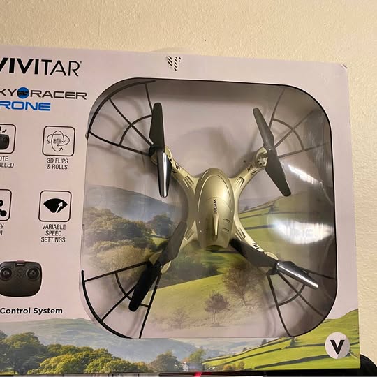 Vivitar Sky Racer drone box showing gold quadcopter with four rotors
