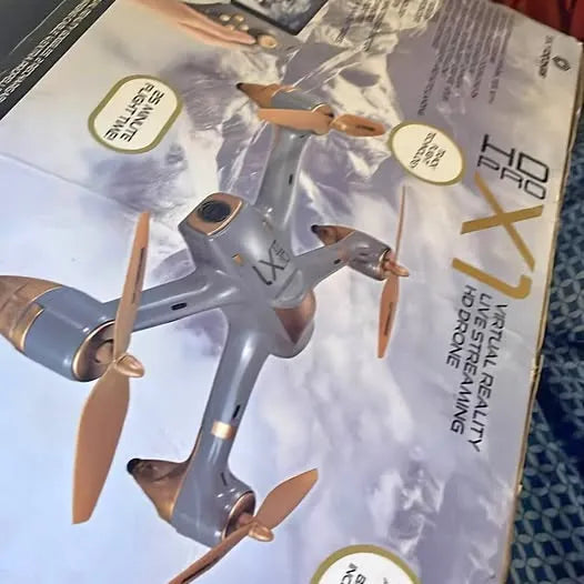 Gray quadcopter drone with four propellers and central body