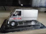 Grey diecast USSR-style truck model in display case, front three-quarter view