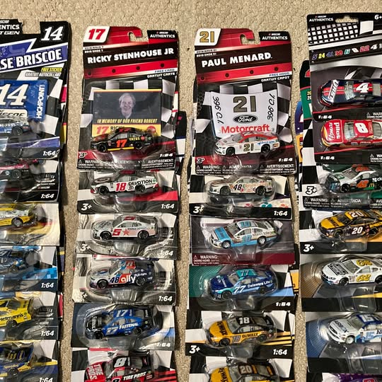 NASCAR Authentics 1/64 diecast race cars in retail blister packaging