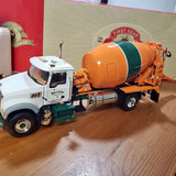 First Gear diecast metal Mack cement mixer truck with orange and green drum