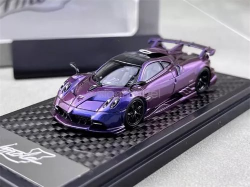 1/64 scale Pagani Imola chameleon diecast car model, purple and blue on display base