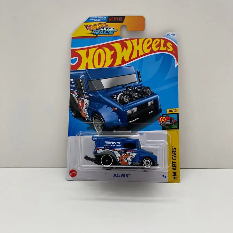 Blue die-cast delivery truck toy with Hot Wheels card, front view, black wheels