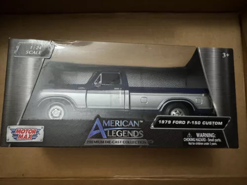 Die-cast 1979 Ford F-150 Custom pickup truck in display box, silver with dark accents