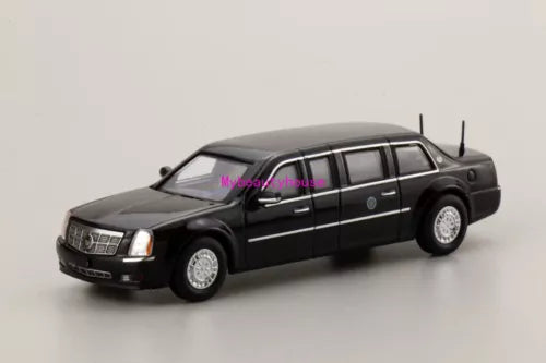 Black diecast limo model car with chrome grille, long body, roof antennas, wheels