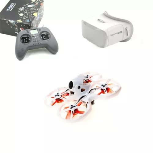 FPV racing drone and gray remote controller with white accessory box