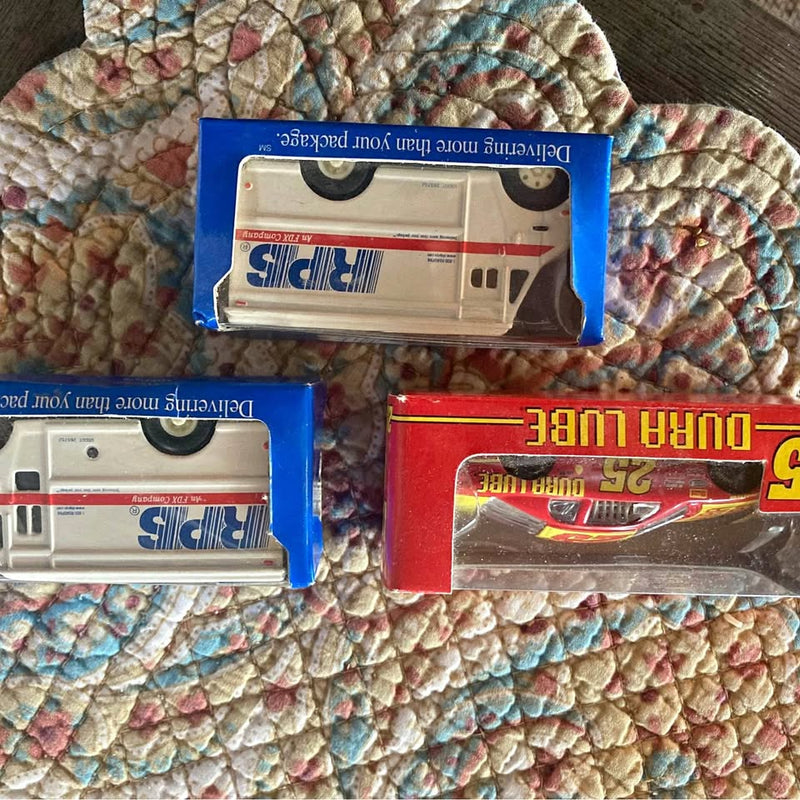 1/64 vintage diecast model truck set, two boxed trucks in blue and red packaging