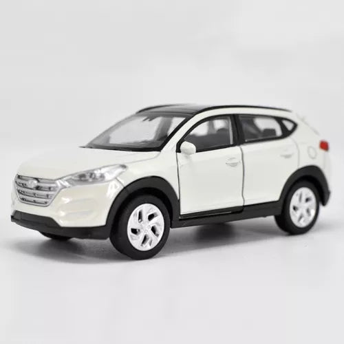 White 1:36 diecast SUV model car with black wheels and clear windows