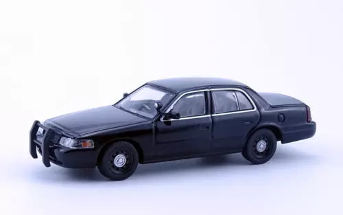 1:64 diecast police interceptor sedan, dark blue, front-left side view