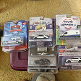 Boxed diecast car assortment in blister packs, police and race vehicles