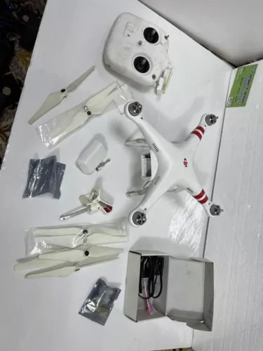 DJI Phantom 2 Vision drone with white body, propellers, and camera mount