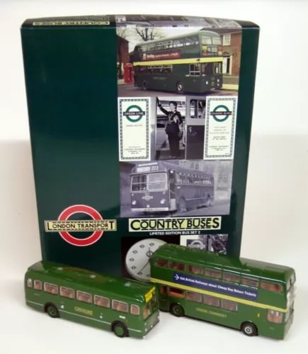 Green diecast model bus set with two double-decker buses in retail packaging