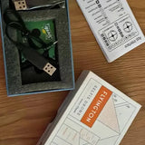Selfie drone in retail box with accessory cables and instruction insert