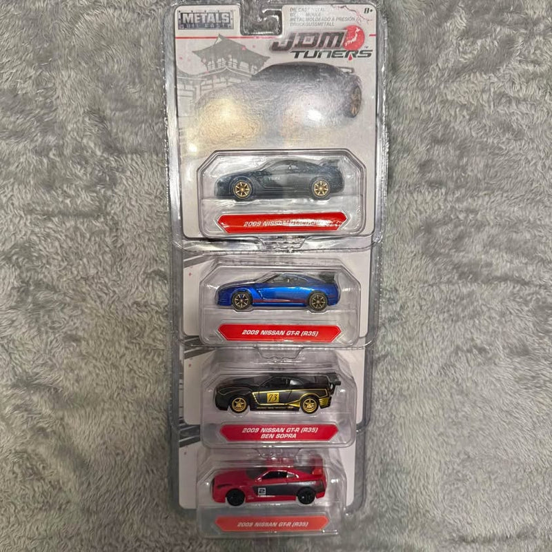 Diecast tuner car set in retail blister pack, with four cars in dark, blue, yellow, and red