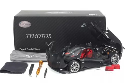 1:18 diecast model car of black Pagani Zonda F with red accents, in gift box