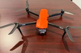 Autel Robotics EVO Lite+ drone with orange body and four gray propellers