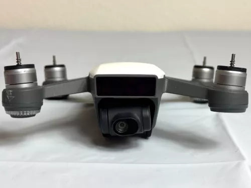 DJI Spark drone with front camera and four propeller arms
