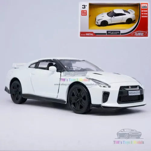 White diecast sports car model with front grille and headlights