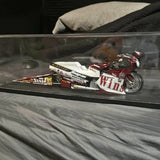 1:9 scale top fuel dragster diecast model, white with red accents, in display case