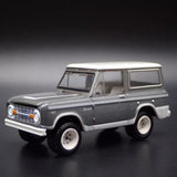 1967 Ford Bronco 1:64 diecast model car, dark gray with white wheels